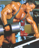 Bodybuilder doing dumbbell rows.